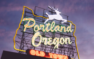 Portland Oregon sign at sunset