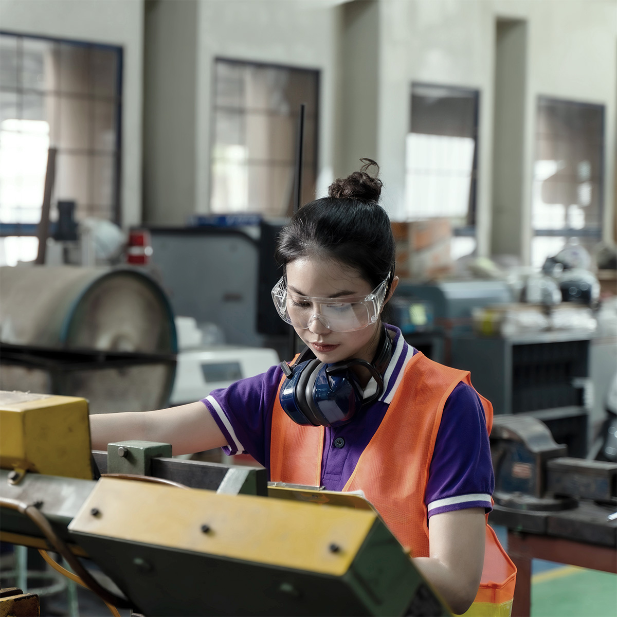 person working at a manufacturing facility